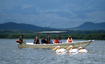 Guests enjoying a boat ride on Lake Naivasha, Kenya