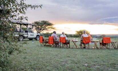 Sundowner drinks overlooking the Mara plains at Zebra Plains Mara Camp 2