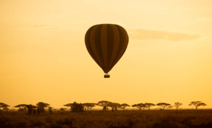 Hot air balloon over the Masai Mara at sunrise, Kenya