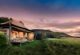 Sunset over the Masai Mara plains seen from a luxury tented camp