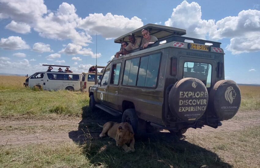 4x4 safari vehicles on a game drive across the savannah during a Kenya Honeymoon Safari.