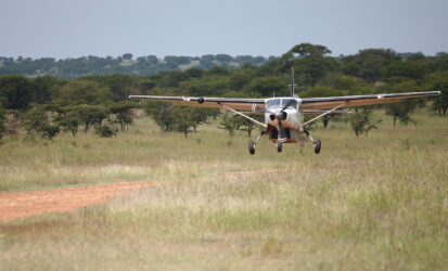A plane landing on Tanzania Fly In Safaris