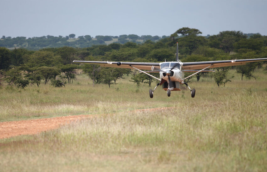 A plane landing on Tanzania Fly In Safaris