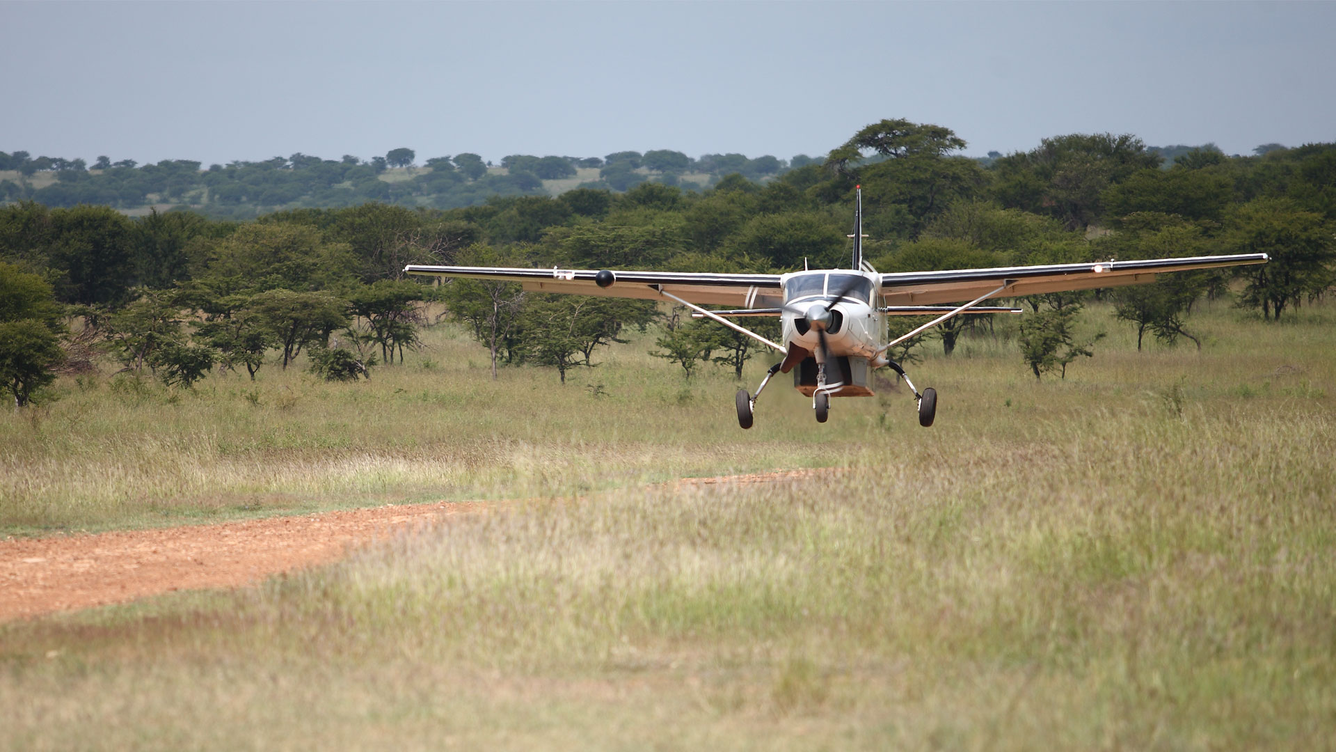 A plane landing on Tanzania Fly In Safaris
