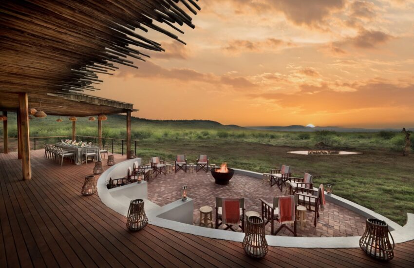 Luxury Kenya Honeymoon Safari lodge with a romantic sunset and dining terrace overlooking the African wilderness